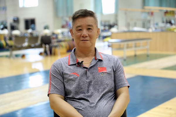 陈伟强谌利军挺过挫折举起梦想对话两代体育人